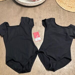 Brand new lot of 2  Capezio Black Basic Short Sleeve Leotard Child Size m
